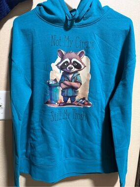 Teal Raccoon Graphic Hoodie - Not My Circus, Still My Trash